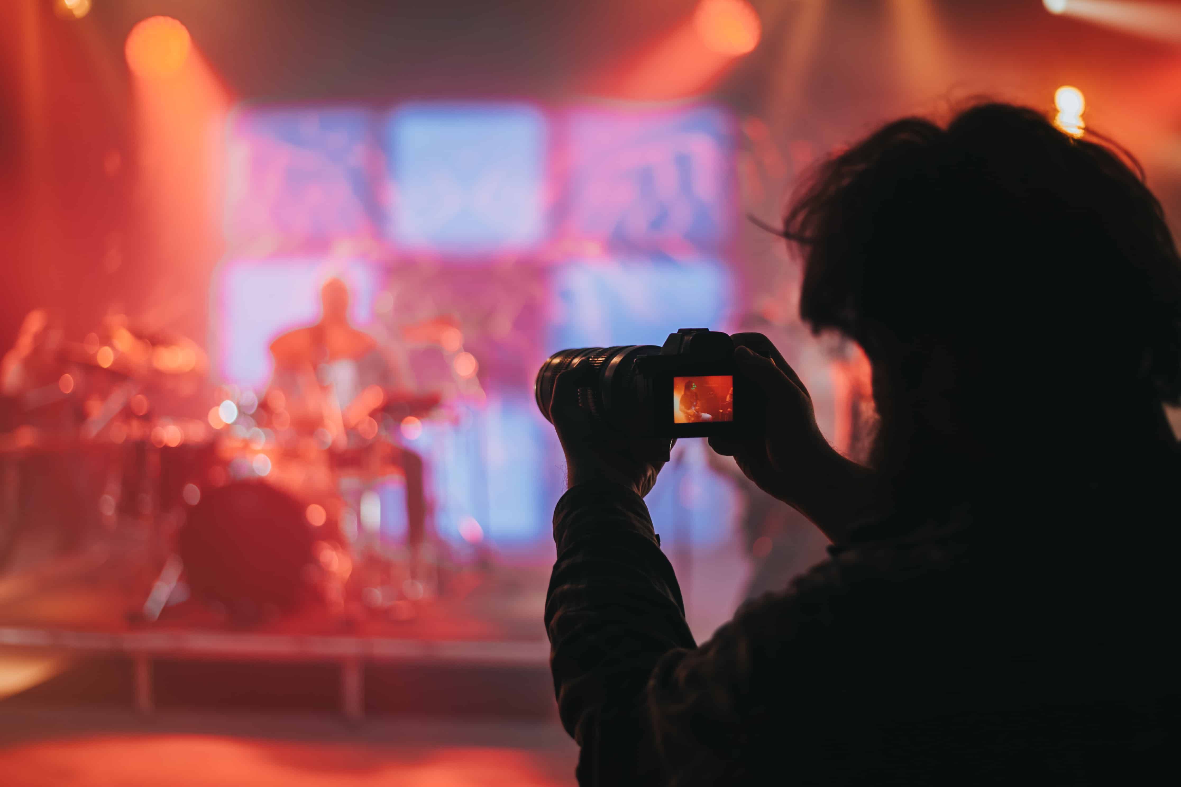 photographe prend clich&Atilde;&copy;s concert